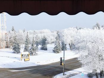 Scenic view of snow covered mountains against sky