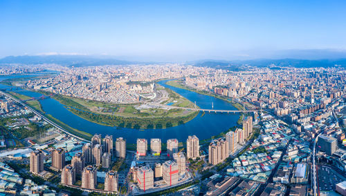 High angle view of city buildings against sky