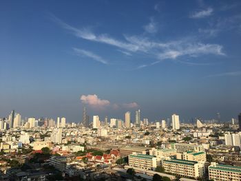 Cityscape against sky during sunset