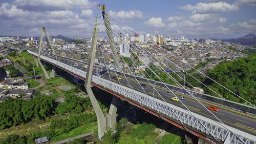 High angle view of bridge in city against sky