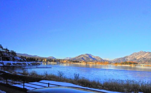 Scenic view of lake against blue sky