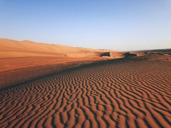 Scenic view of desert against clear sky