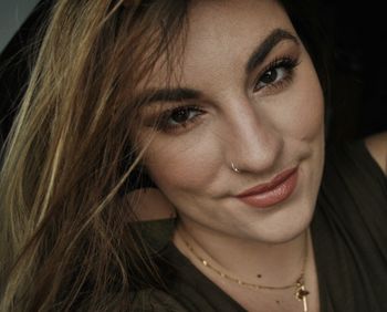 Portrait of beautiful young woman with make-up