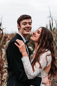 Young couple standing outdoors