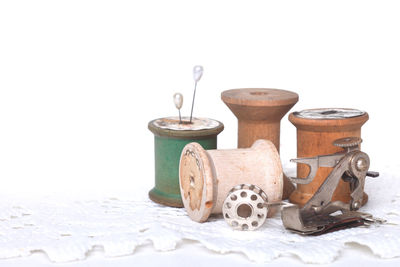 Close-up of old objects against white background