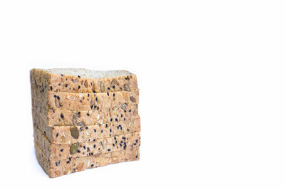 Close-up of bread against white background