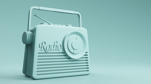 Close-up of telephone booth against white background