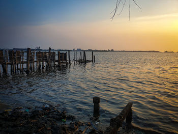 Scenic view of sea against sky during sunset