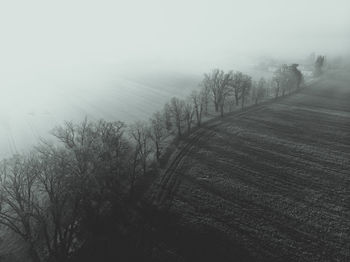 Scenic view of land against sky during winter