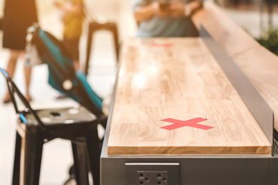 Close-up of red chair on table at home