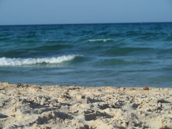 Scenic view of sea against clear sky