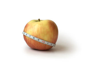 Close-up of apple against white background