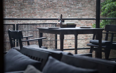 Empty chairs and table in restaurant