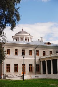 Building against cloudy sky