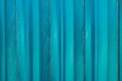 Full frame shot of blue metal fence