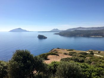 Scenic view of sea against blue sky