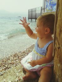 Girl looking at sea