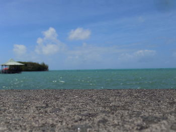 Scenic view of sea against blue sky