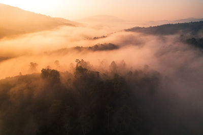 Scenic view of landscape against sky during sunset