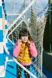 Portrait of smiling girl with umbrella