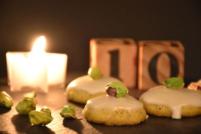 Close-up of candles on table