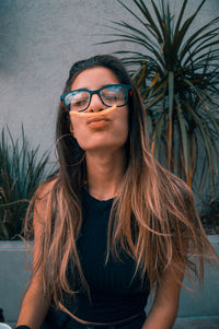 Portrait of smiling young woman