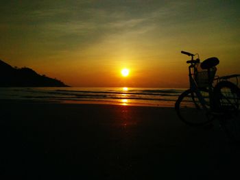 Scenic view of sea at sunset