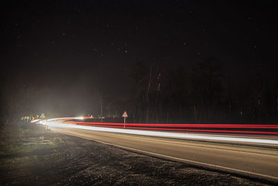 Light trails on road at night