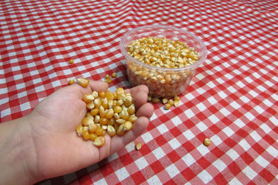 High angle view of hand holding food