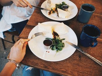 High angle view of people having food