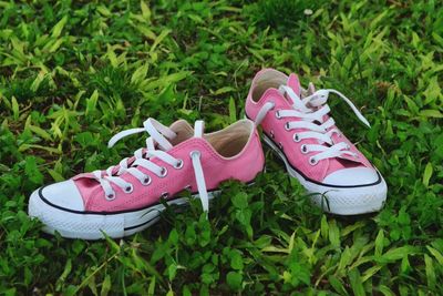 High angle view of shoes on grass