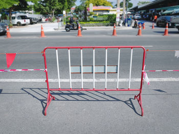 Close-up movable metal fence on the road