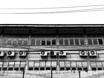 Air conditioner unit on exterior wall of building