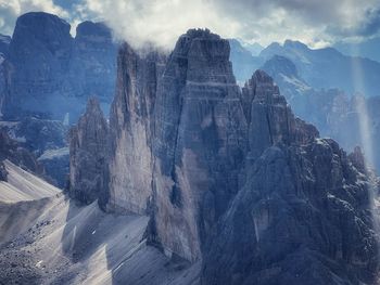 Panoramic view of rocky mountains against sky