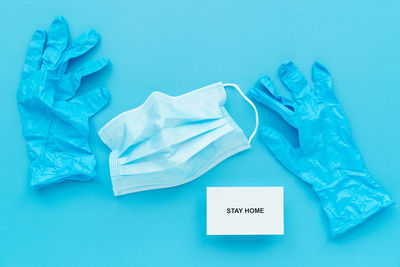 High angle view of text on blue table