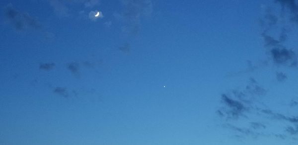 Low angle view of blue sky at night