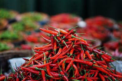 Close-up of red chili peppers for sale at market stall