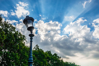 Low angle view of street light against sky