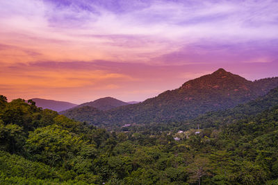 Scenic view of mountains against sky during sunset