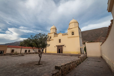 Low angle view of historic building against sky