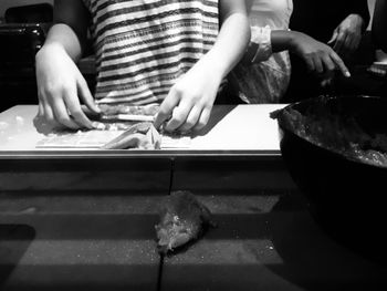 Close-up of person preparing food