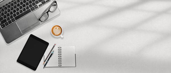 High angle view of coffee cup on table