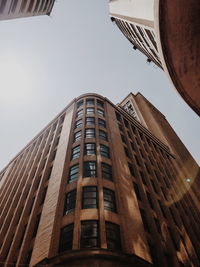 Low angle view of buildings against clear sky