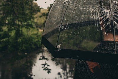 Close-up of wet glass during rainy season