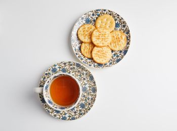 High angle view of breakfast on table against white background