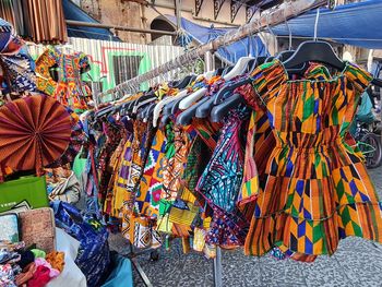 Low section of woman standing on street