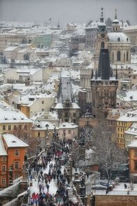 High angle view of buildings in city during winter