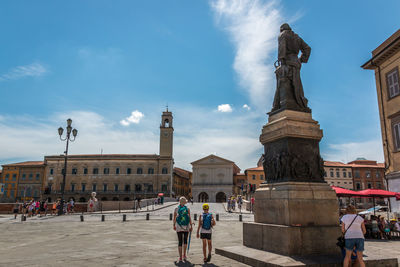 Group of people in front of historical building