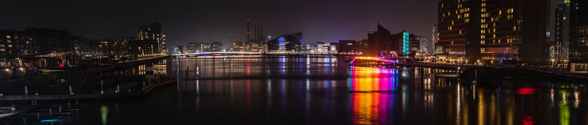 Illuminated buildings at waterfront