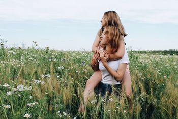 HAPPY WOMAN ON FIELD